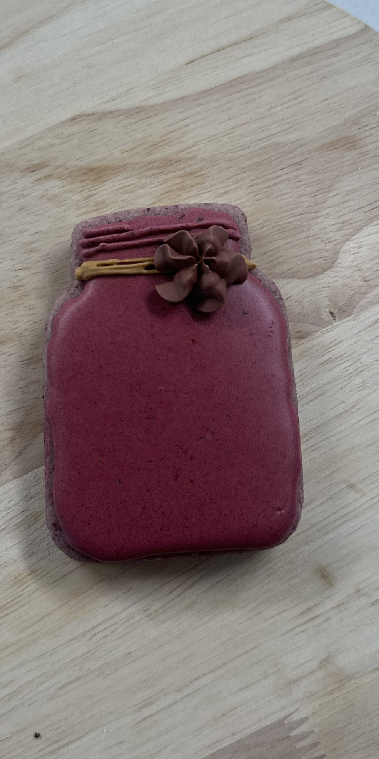 Hand-decorated purple mason jar cookie